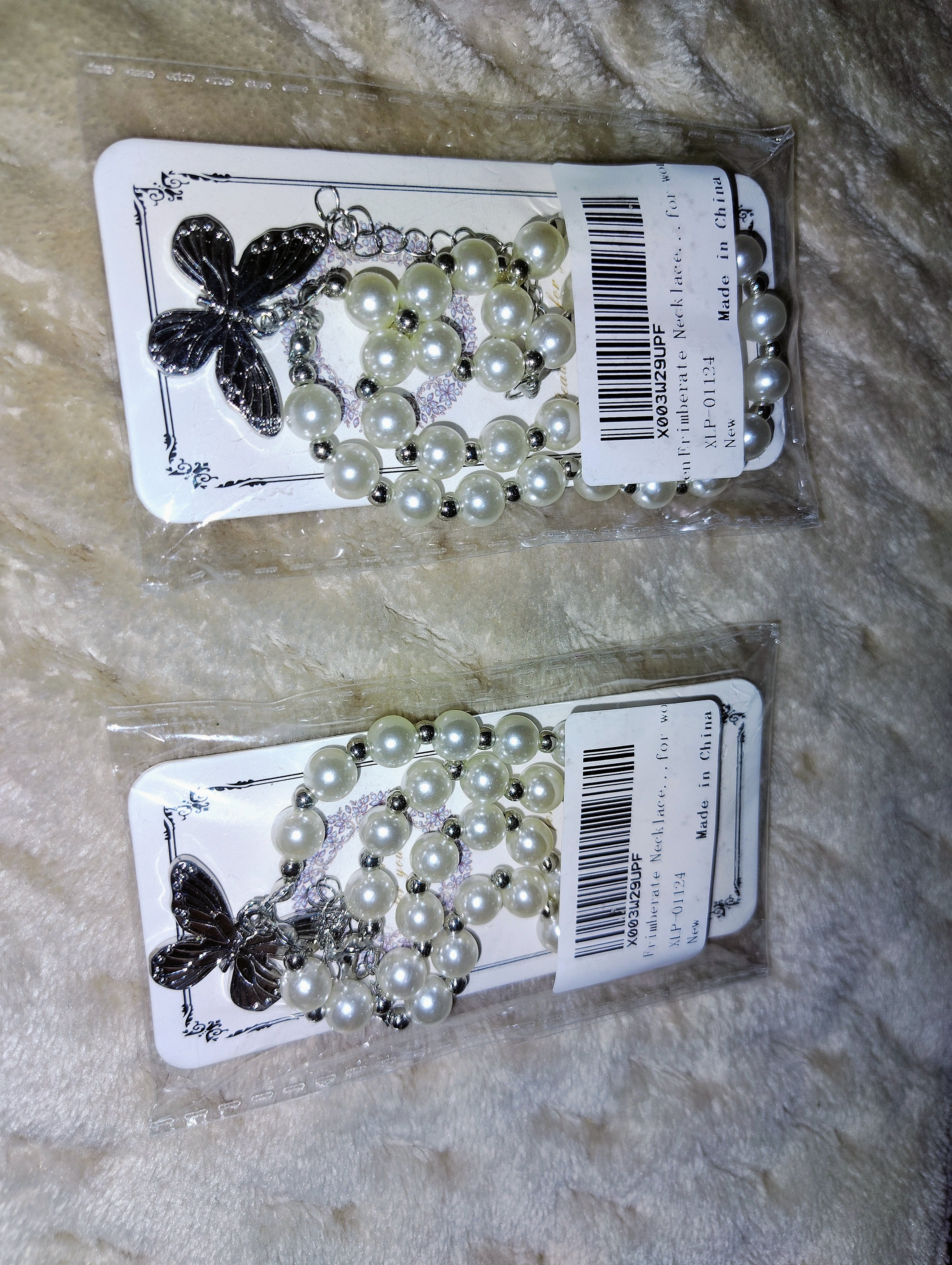 Butterfly pearl necklaces (not real pearls)